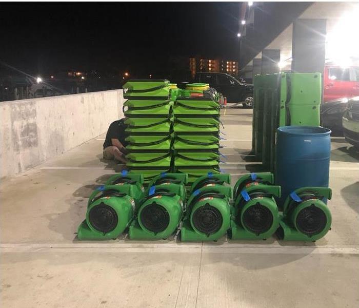 SERVPRO water restoration equipment stacked at location